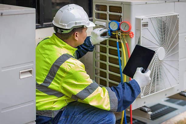 Professional Heat Pump Repair technician working in Glen Burnie, MD